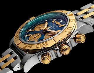 Professional retouching of Breitling watch advertising image by Zeeto